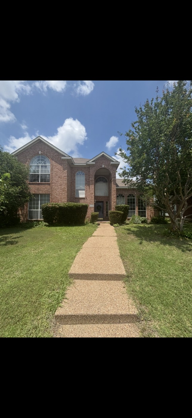 Two-story brick home bought for cash by Lucci Buys Houses in Allen, TX